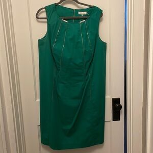 Calvin Klein sleeveless dress with zipper decoration.